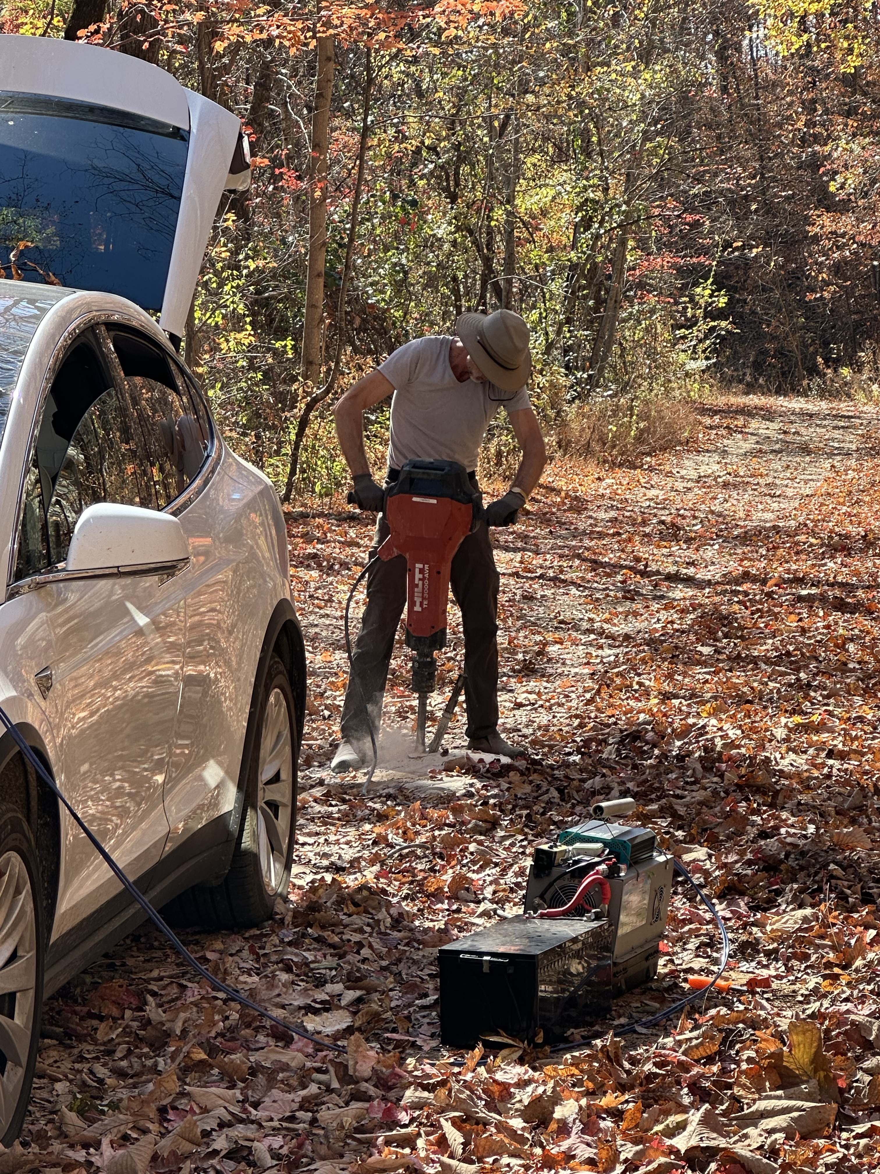Daniel using jack hammer in Tennessee. Picture by Happy Vegan Campers.