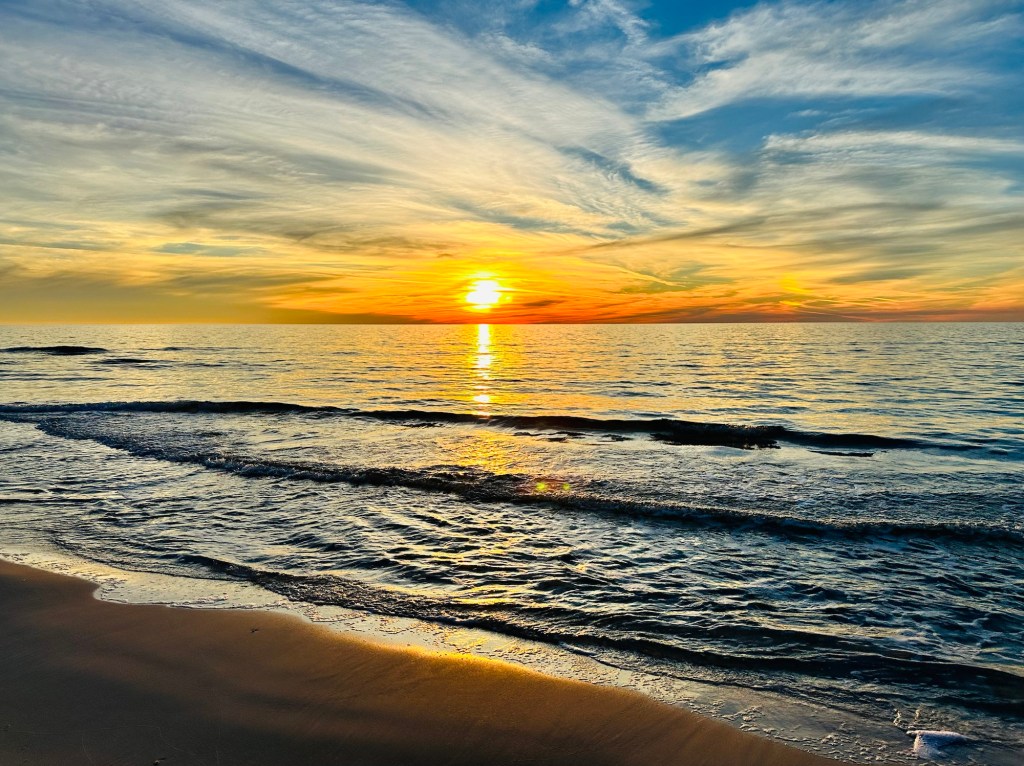 Sunset on beach at T.H. Memorial St. Joseph Peninsula State Park in Port St. Joe, Florida. Picture by Happy Vegan Campers.