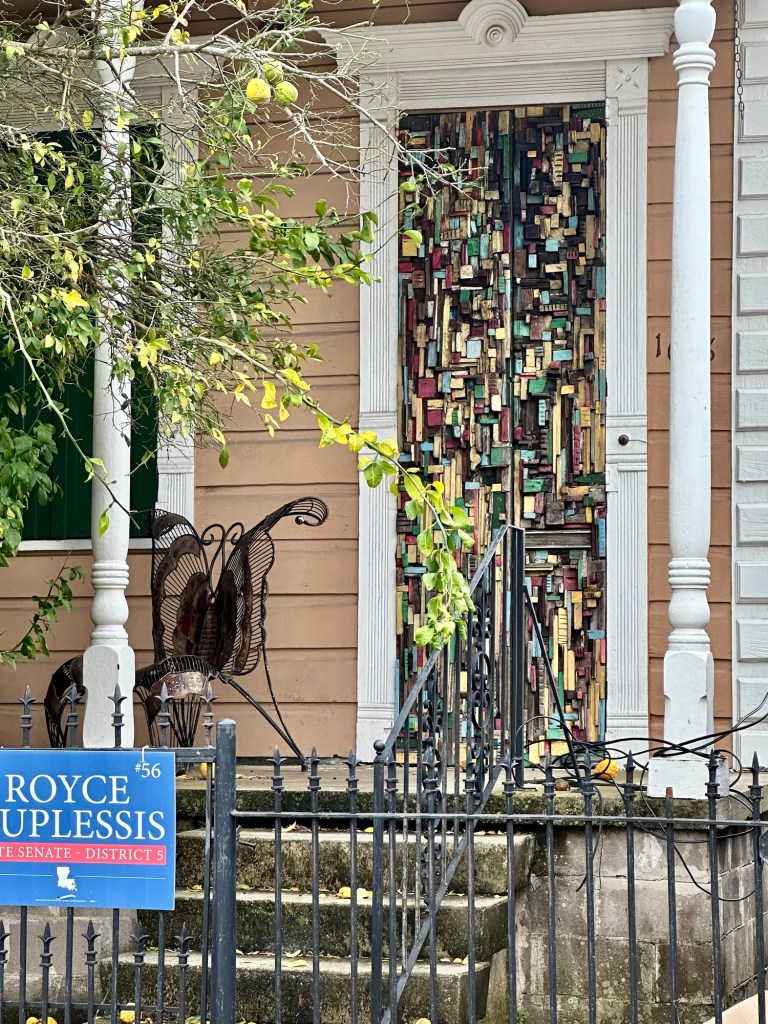 Wooden quilt folk art by Jean-Marcel St. Jacques in New Orleans, Louisiana. Picture by Happy Vegan Campers.
