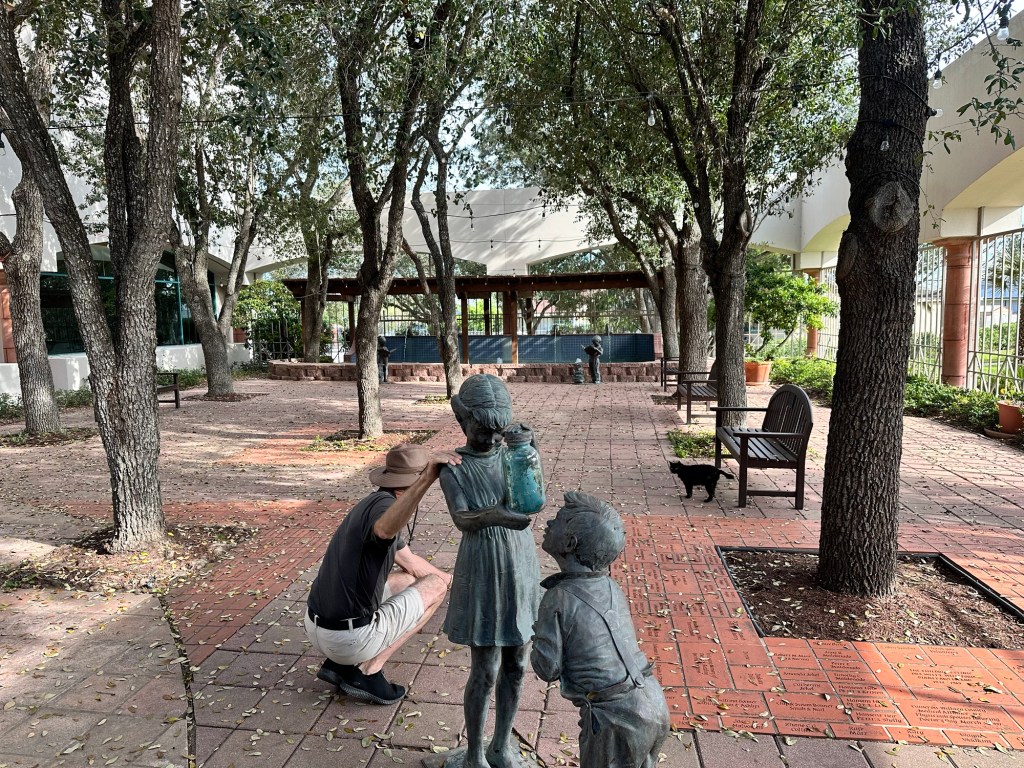 Daniel in courtyard of library in Harlingen, Texas. Picture by Happy Vegan Campers.