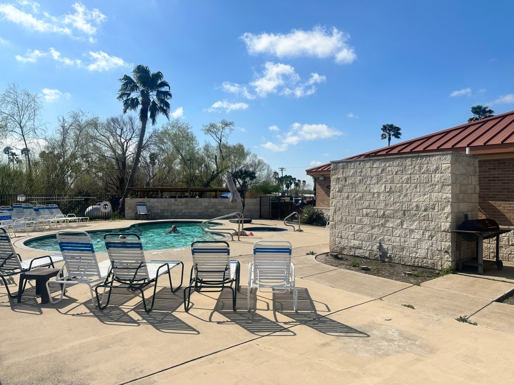 Happy Vegan Campers at Encore Sunshine RV Resort in Harlingen Texas lakeside pool