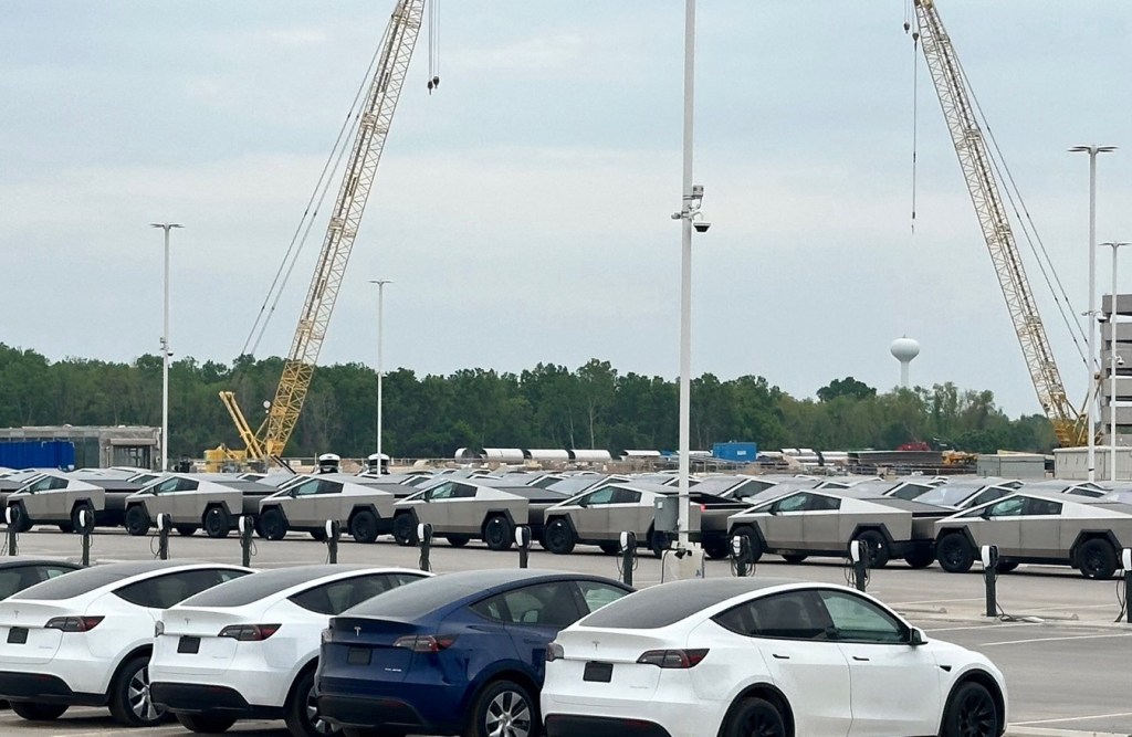 Happy Vegan Campers at Tesla factory with Cybertrucks in Austin Texas