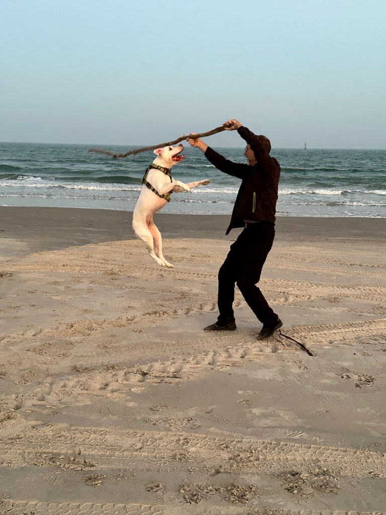 Daniel and Peter at Mustang Island State Park beach in Corpus Christi, Texas. Picture by Happy Vegan Campers.