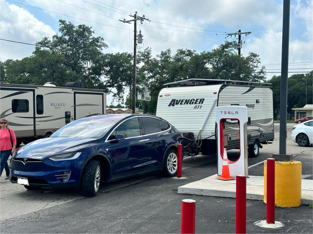 Happy Vegan Campers another Tesla pulling a camper