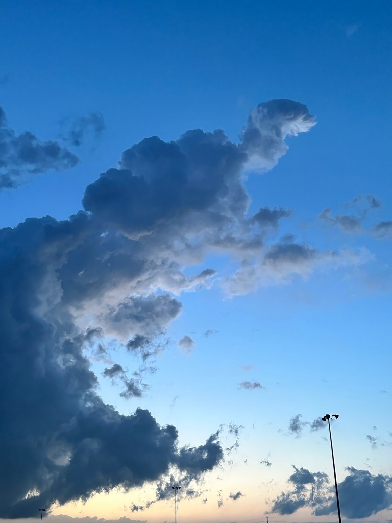 Happy Vegan Campers clouds over Kansas