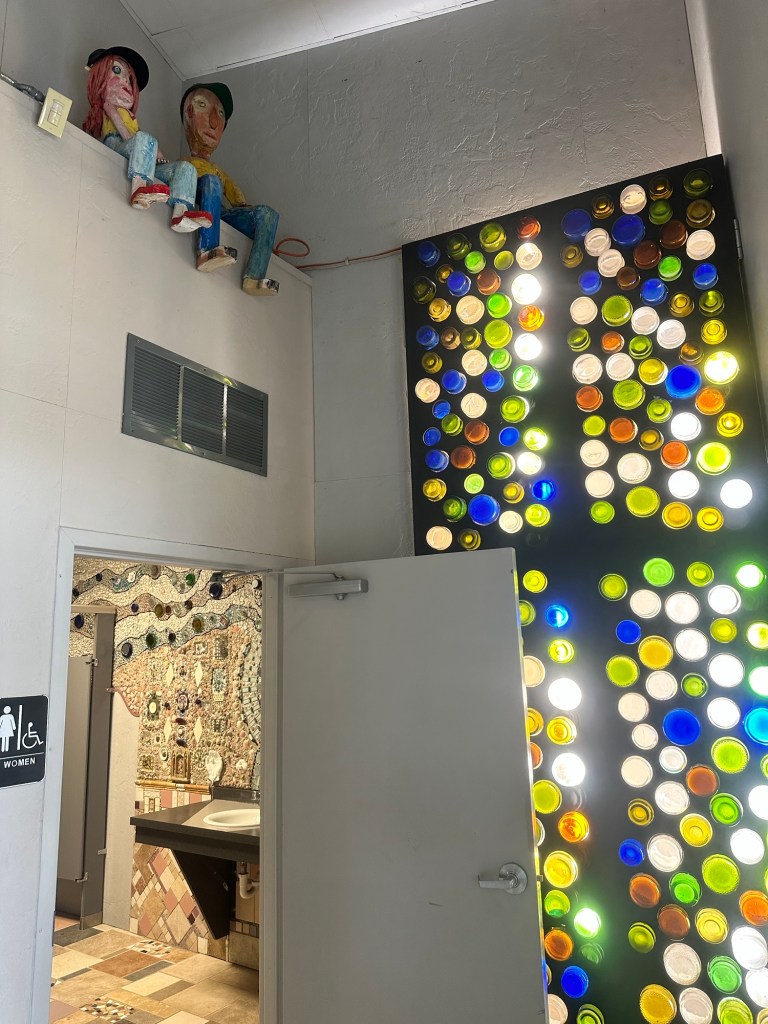 Happy Vegan Campers giant toilet restroom in Lucas Kansas