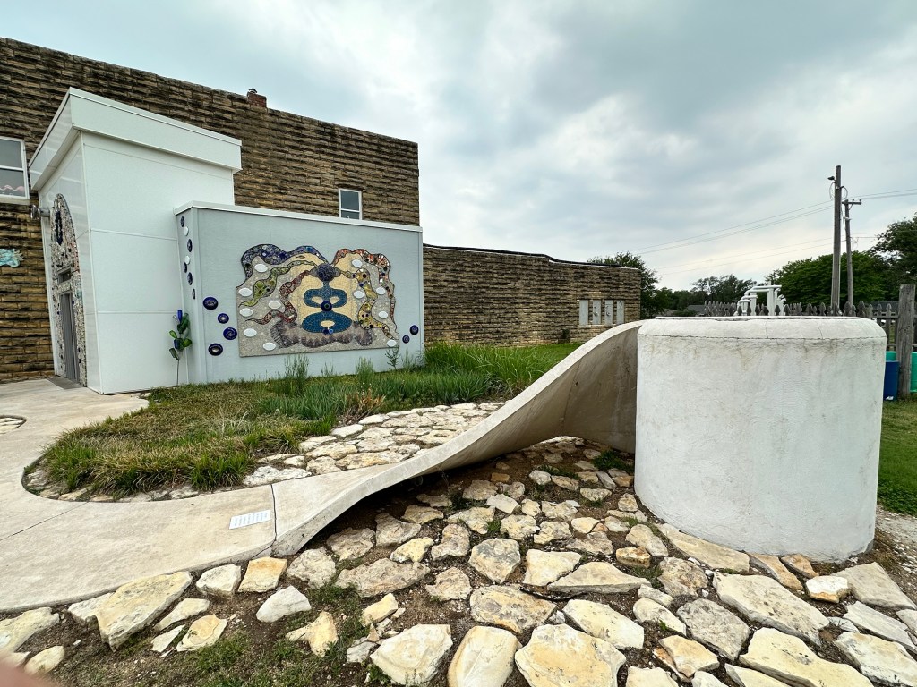 Happy Vegan Campers giant toilet restroom in Lucas Kansas