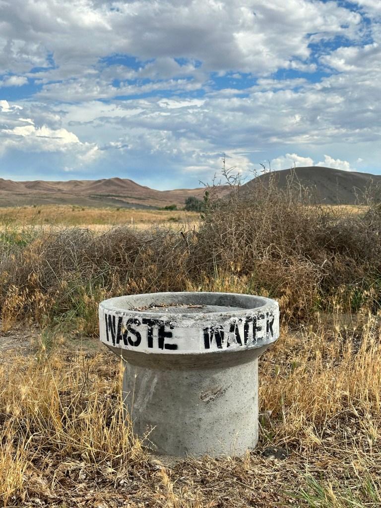 Grey water receptacle at Bruneau Dunes State Park in Bruneau, Idaho by Happy Vegan Campers