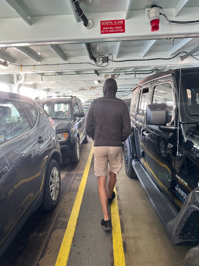 Daniel on ferry by Happy Vegan Campers