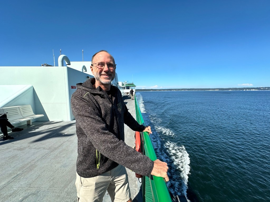 Daniel on the ferry in Washington by Happy Vegan Campers