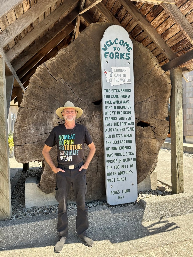 Daniel with Sitka tree in Forks, Washington by Happy Vegan Campers