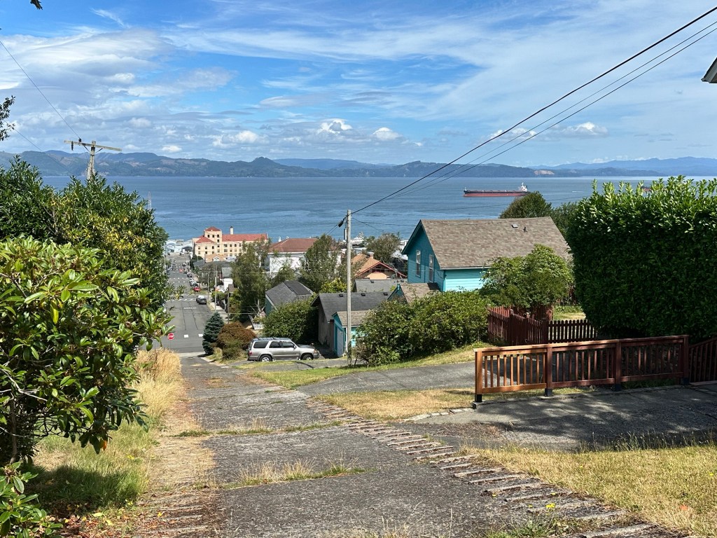 View from hillside neighborhood down to Astoria, Oregon by Happy Vegan Campers