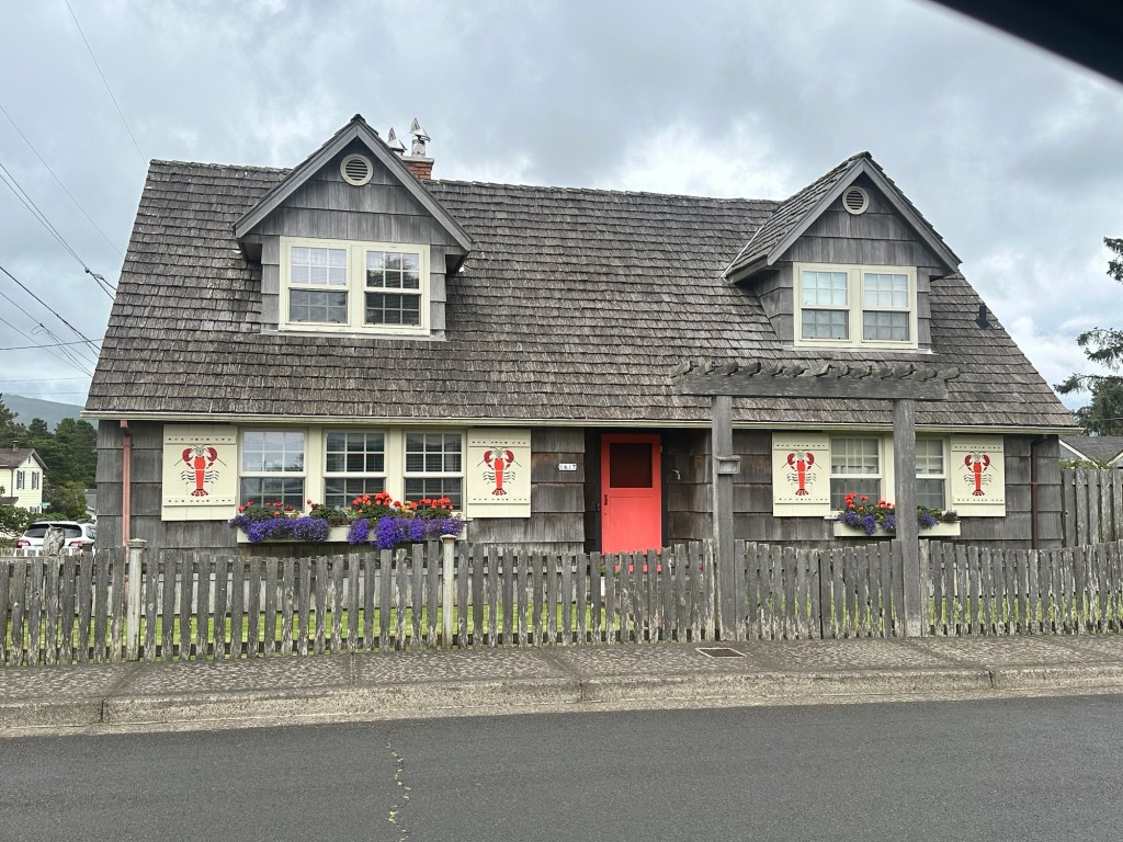 House with lobster shutters in Seaside, Oregon by Happy Vegan Campers