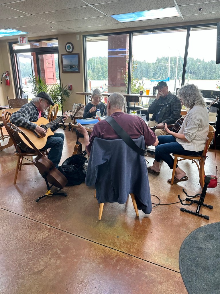 Live music at Bridgeport Marketplace in Florence, Oregon by Happy Vegan Campers