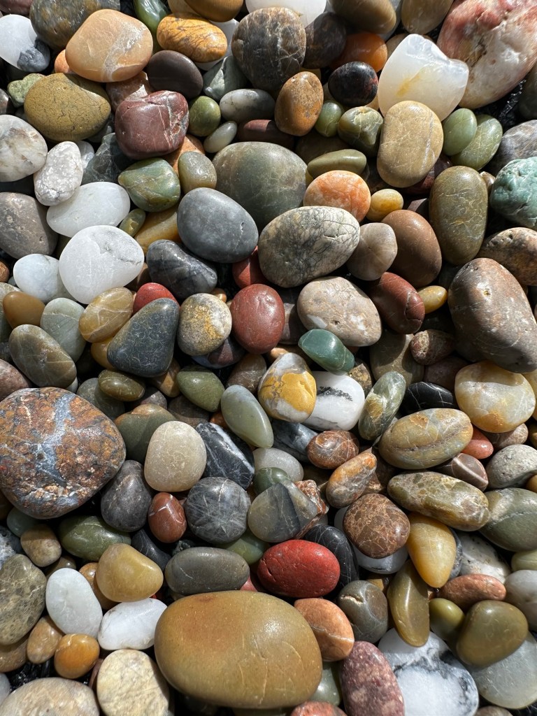 Small, naturally polished stones found on beach near Fort Bragg, California by Happy Vegan Campers
