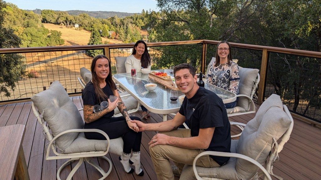 Ashely, Taylor, Kim, and Kristin enjoying dinner by Happy Vegan Campers