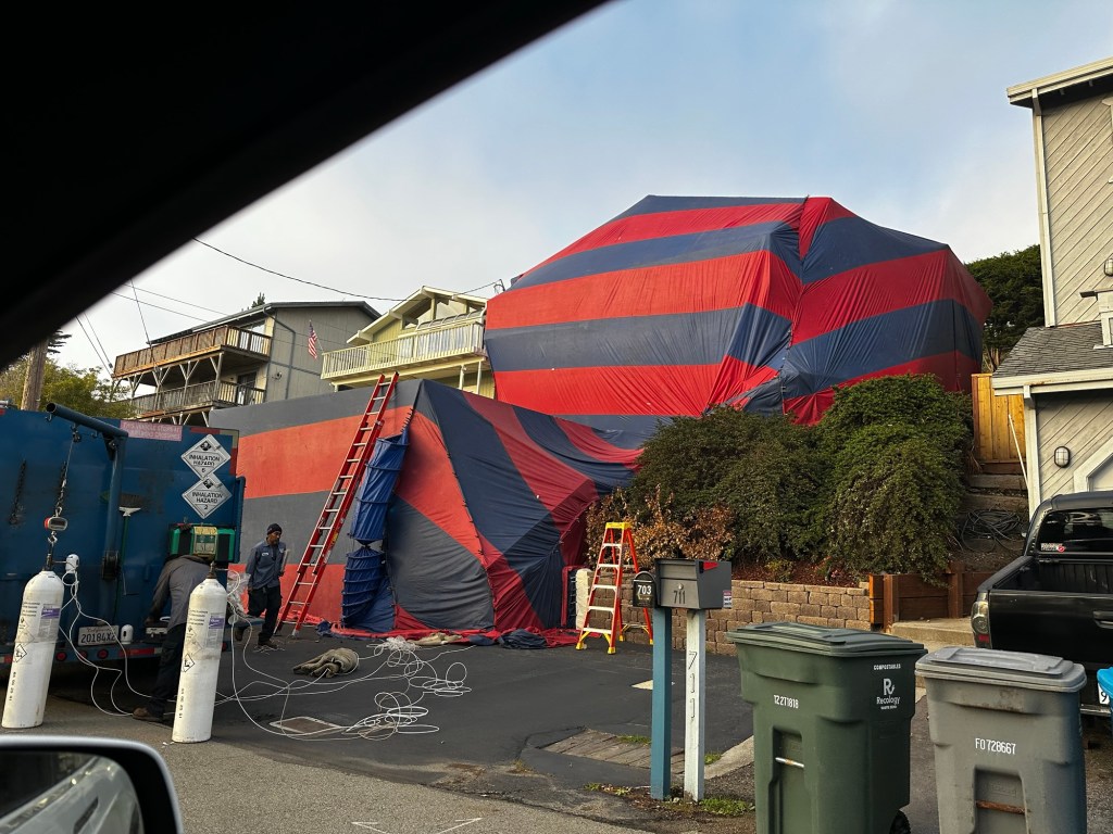 House covered for fumigation in California by Happy Vegan Campers