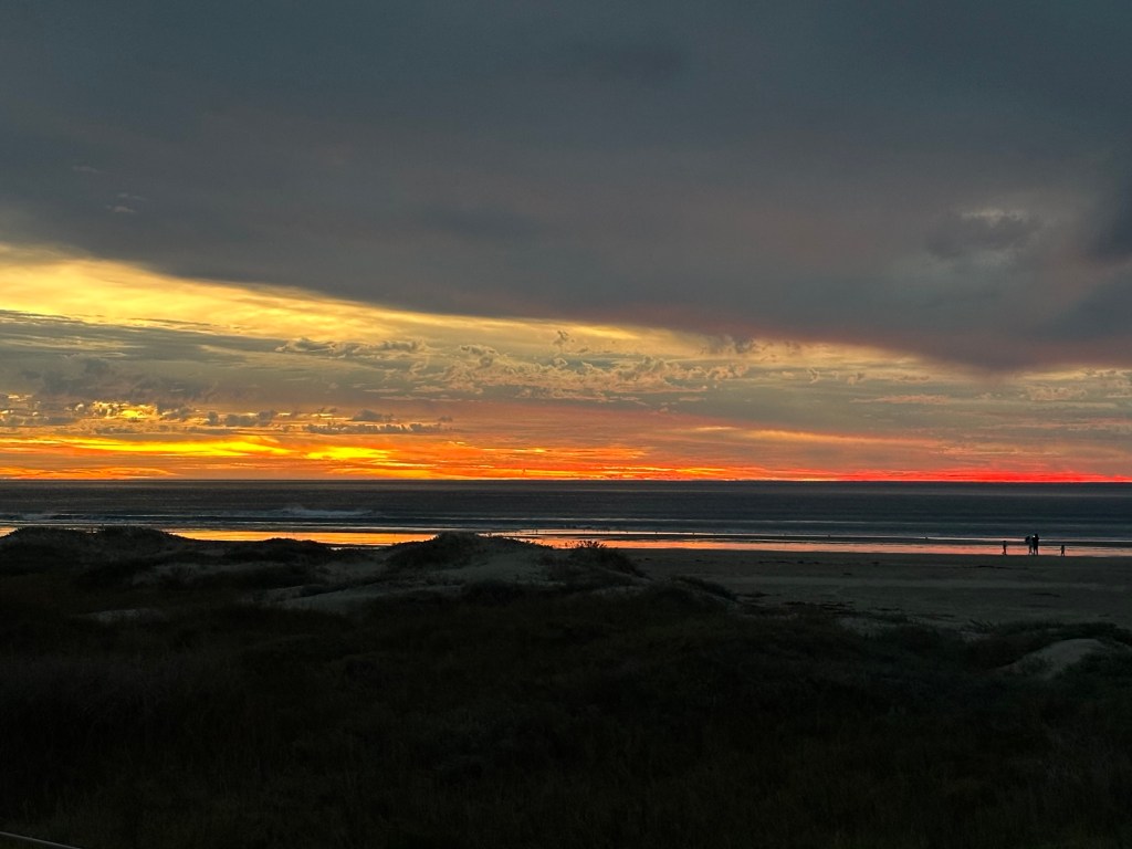 Sunset at Morro Strand State Beach in Morro Bay, California. Picture by Happy Vegan Campers.