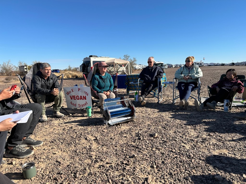Demonstration of GoSun solar oven at Rolling Vegan Rendezvous in Quartzsite, Arizona. Picture by Happy Vegan Campers.