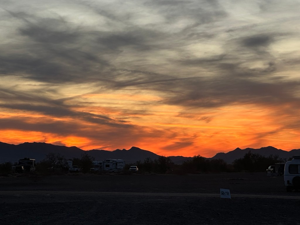 Sunset at Rolling Vegan Rendezvous in Quartzsite, Arizona. Picture by Happy VeganCampers.