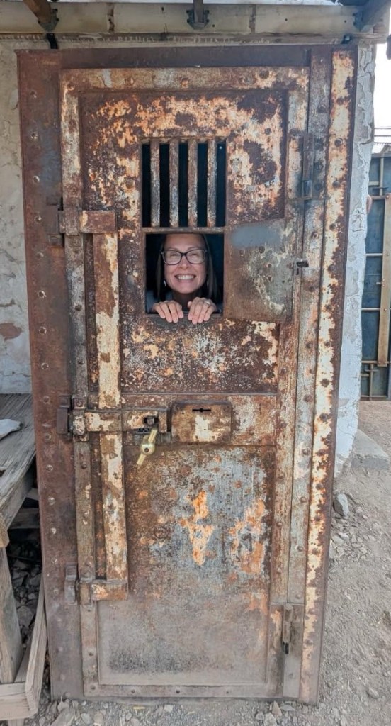 Kristin in solitary confinement cell in Oatman, Arizona. Picture by Happy Vegan Campers.