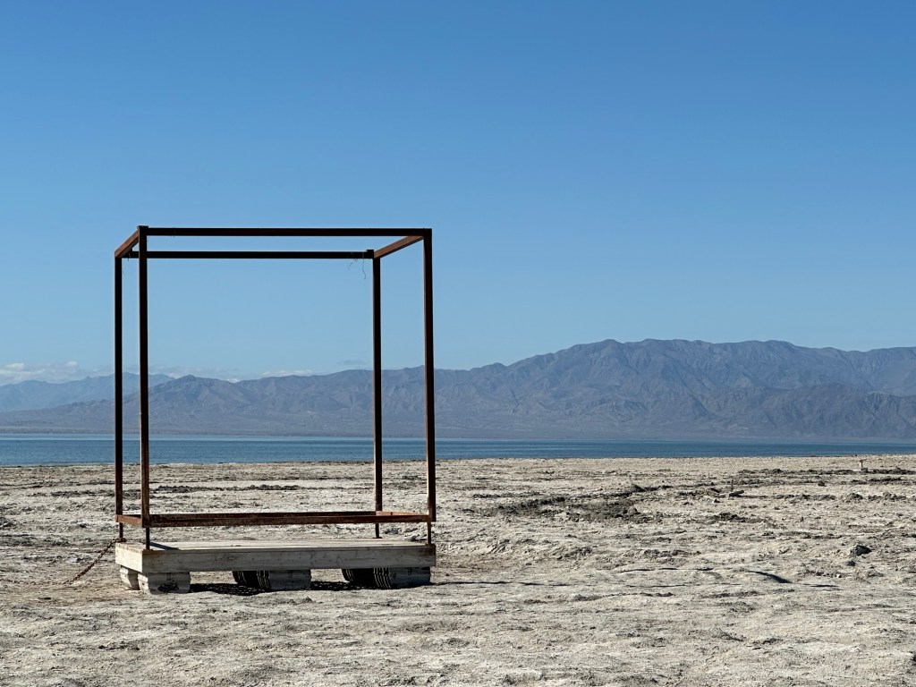 Art on beach in Bombay Beach, California. Picture by Happy Vegan Campers.