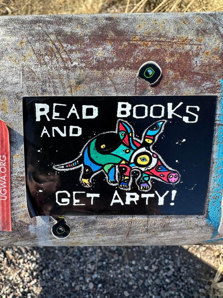 Sticker on guard rail in Gila National Forest in New Mexico. Picture by Happy Vegan Campers.