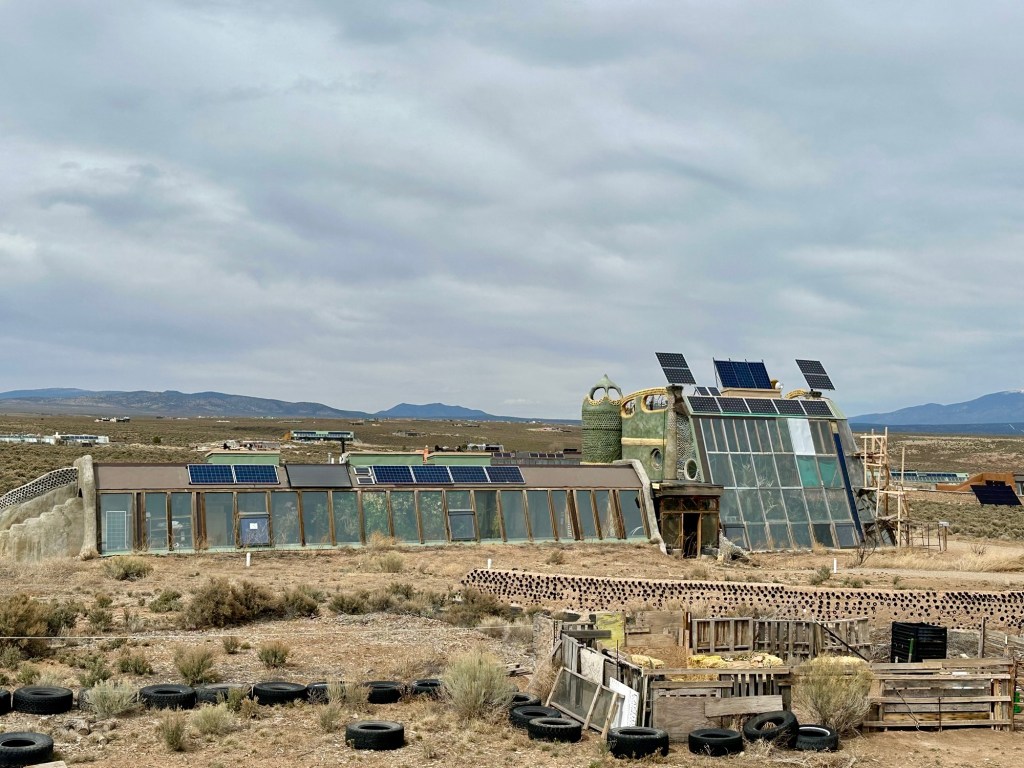 Earthship at the Great World Community in Taos, New Mexico. Picture by Happy Vegan Campers.