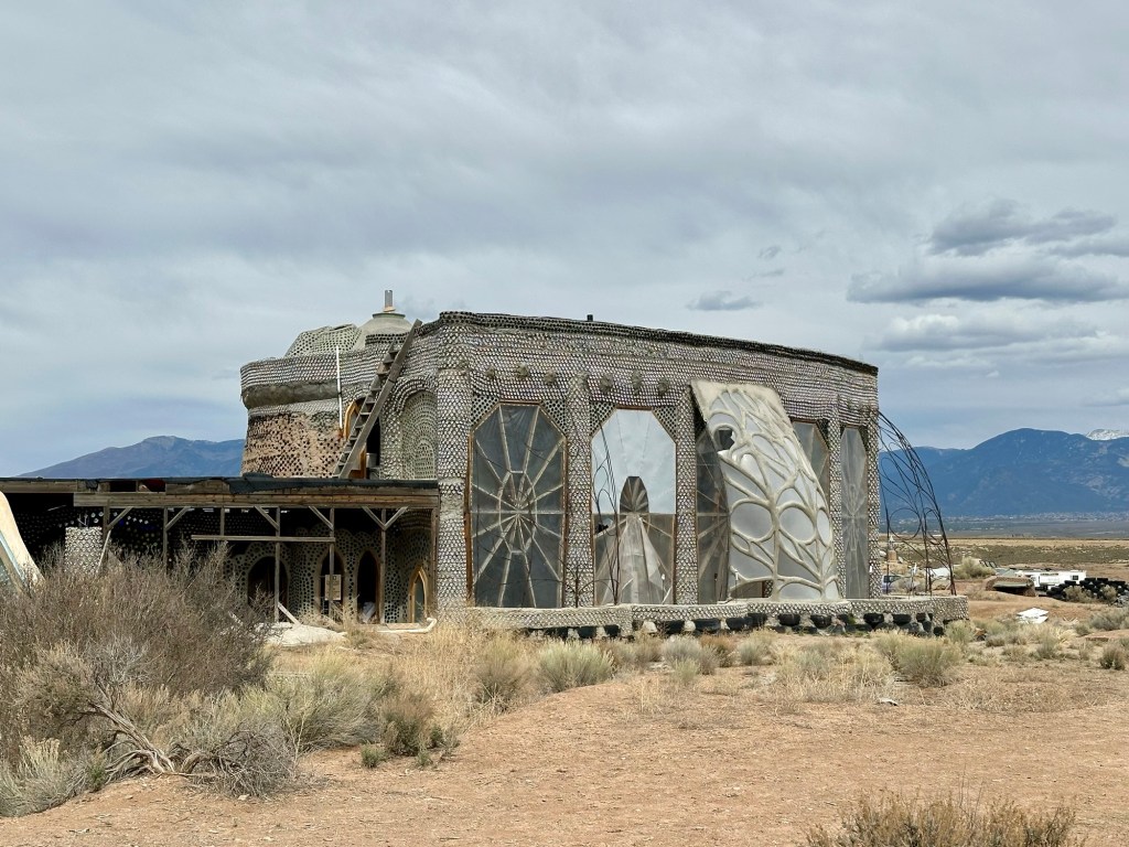 Earthship at the Great World Community in Taos, New Mexico. Picture by Happy Vegan Campers.