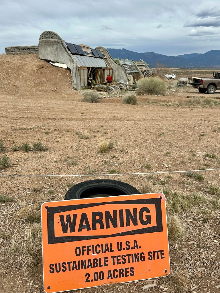 Earthship at the Great World Community in Taos, New Mexico. Picture by Happy Vegan Campers.