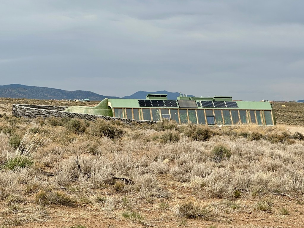 Earthship at the Great World Community in Taos, New Mexico. Picture by Happy Vegan Campers.