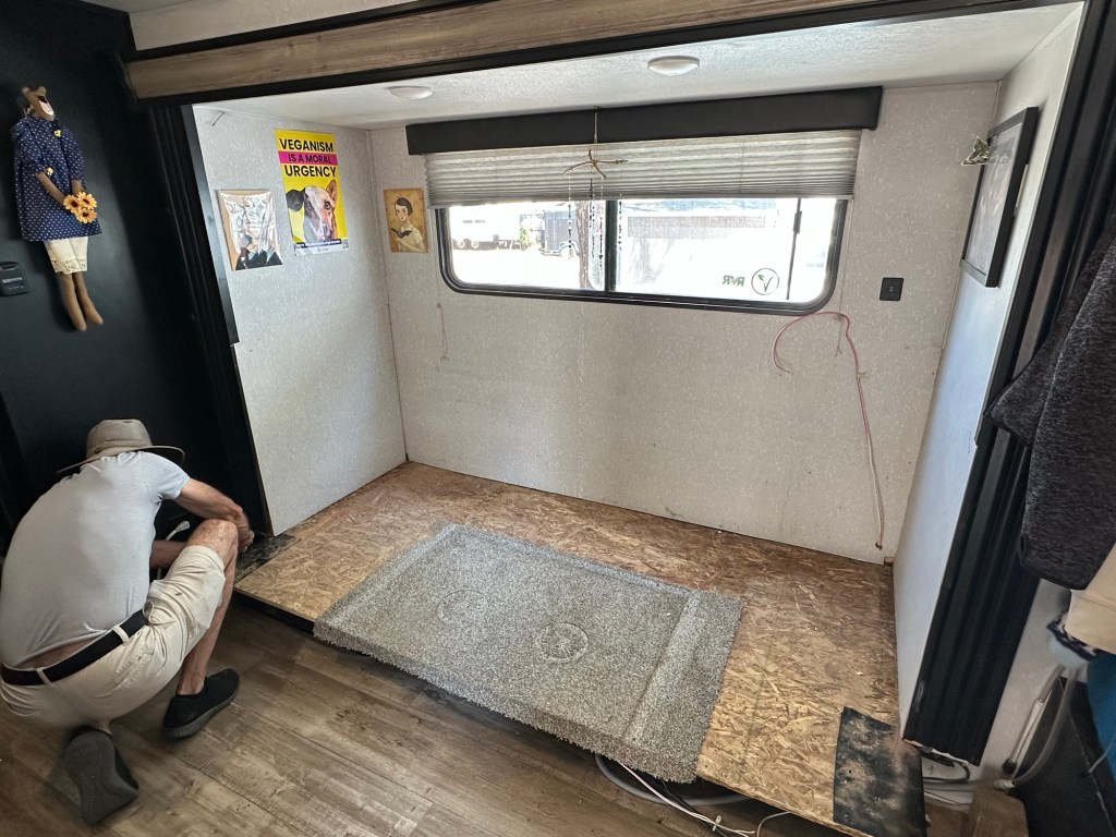 Dinette removed from camper slide out. Picture by Happy Vegan Campers.