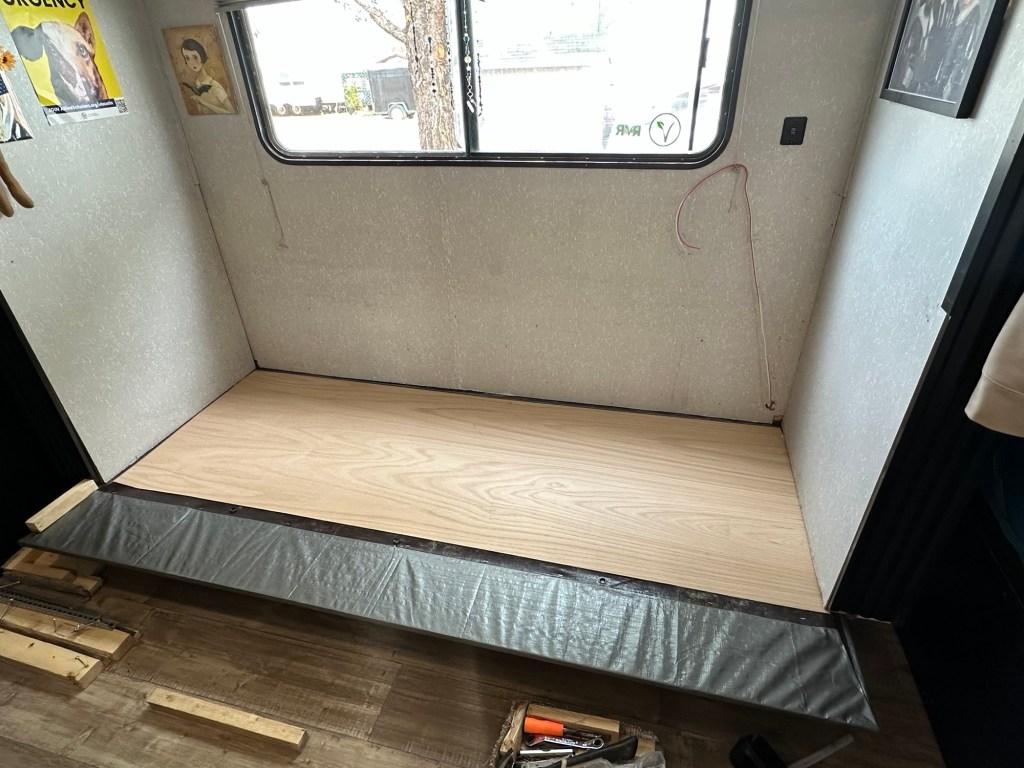 New floor in camper slide out. Picture by Happy Vegan Campers.