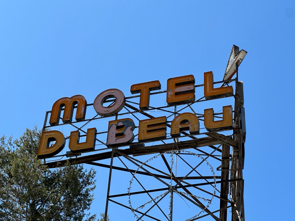 Old hotel sign in Flagstaff, Arizona. Picture by Happy Vegan Campers.