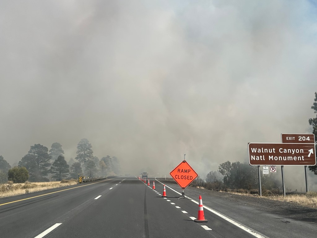 Controlled fire at exit for Walnut Canyon National Monument in Flagstaff, Arizona. Picture by Happy Vegan Campers.