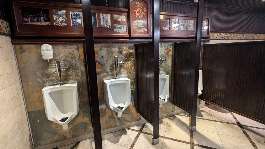 Berlin Wall in men’s restroom at Main Street Casino in Las Vegas, Nevada. Picture by Happy Vegan Campers.