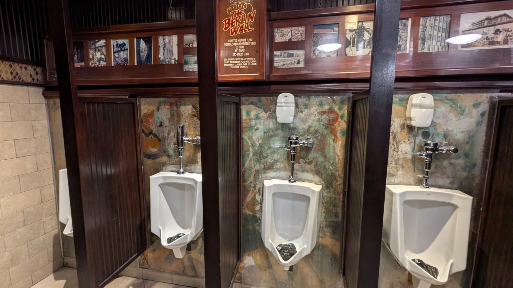 Berlin Wall in men’s restroom at Main Street Casino in Las Vegas, Nevada. Picture by Happy Vegan Campers.