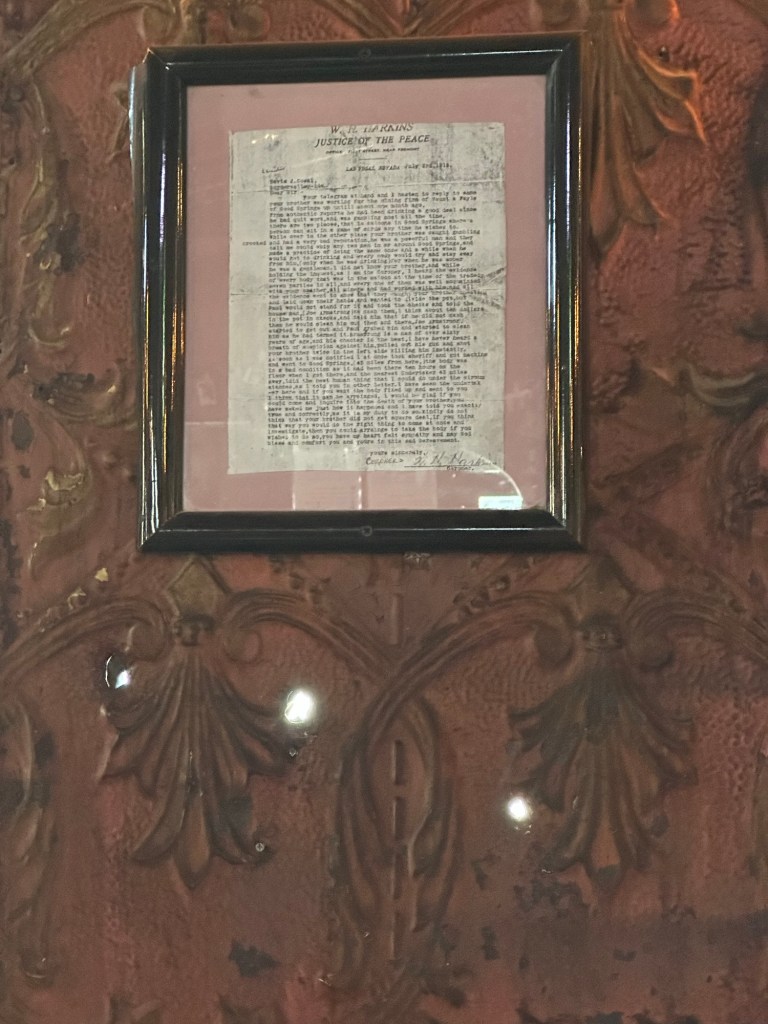 Bullet holes at Pioneer Saloon in Goodsprings, Nevada. Picture by Happy Vegan Campers.