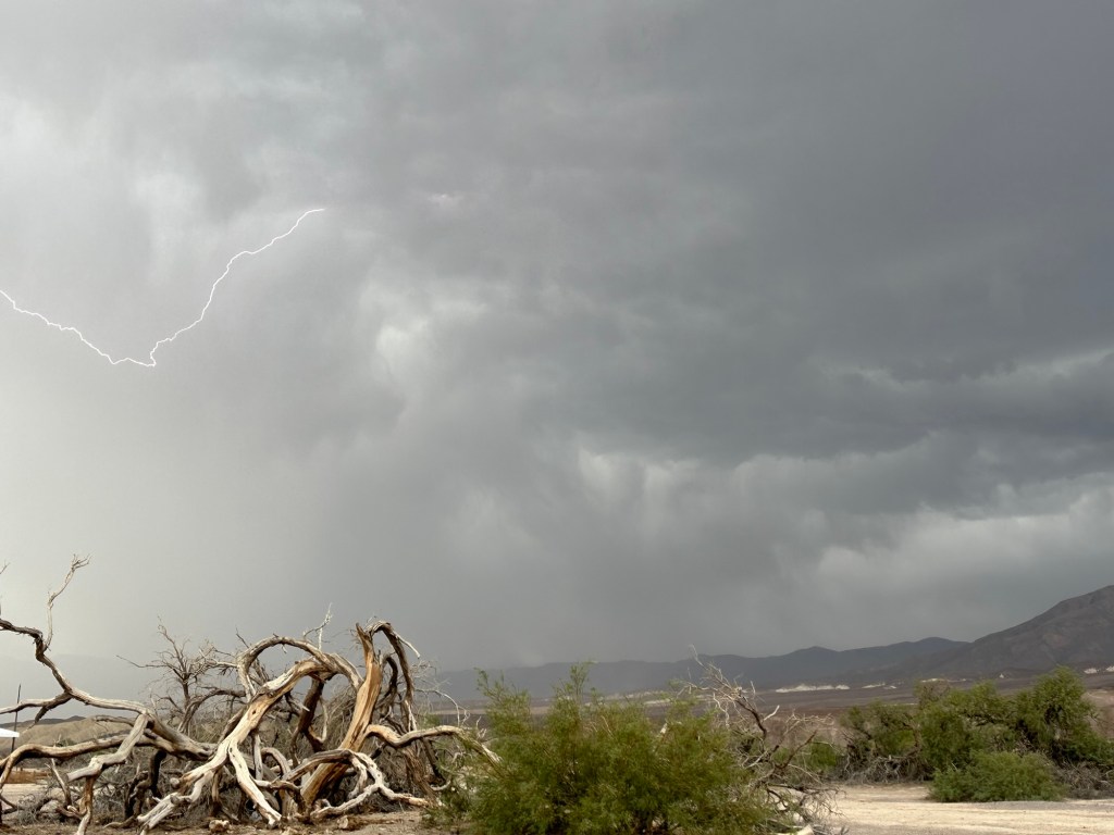 Storm with lightning over Furnace Creek in Death Valley National Park, California. Picture by Happy Vegan Campers.