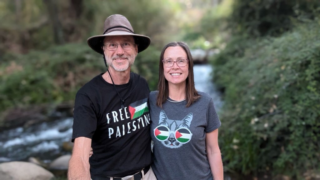 Daniel and Kristin with Free Palestine shirts. Picture by Happy Vegan Campers.