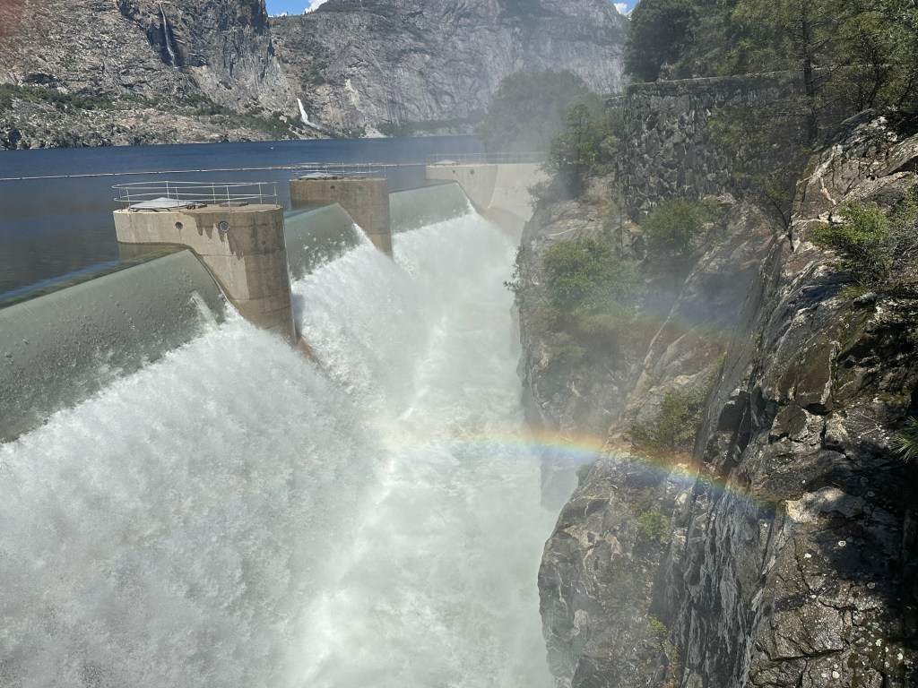 Rainbow and O’Shaughnessy Dam at Hetch Hetchy Reservoir in Yosemite National Park, California. Picture by Happy Vegan Campers.
