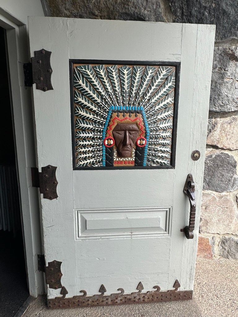 Carved door at Timberline Lodge in Government Camp, Oregon. Picture by Happy Vegan Campers.