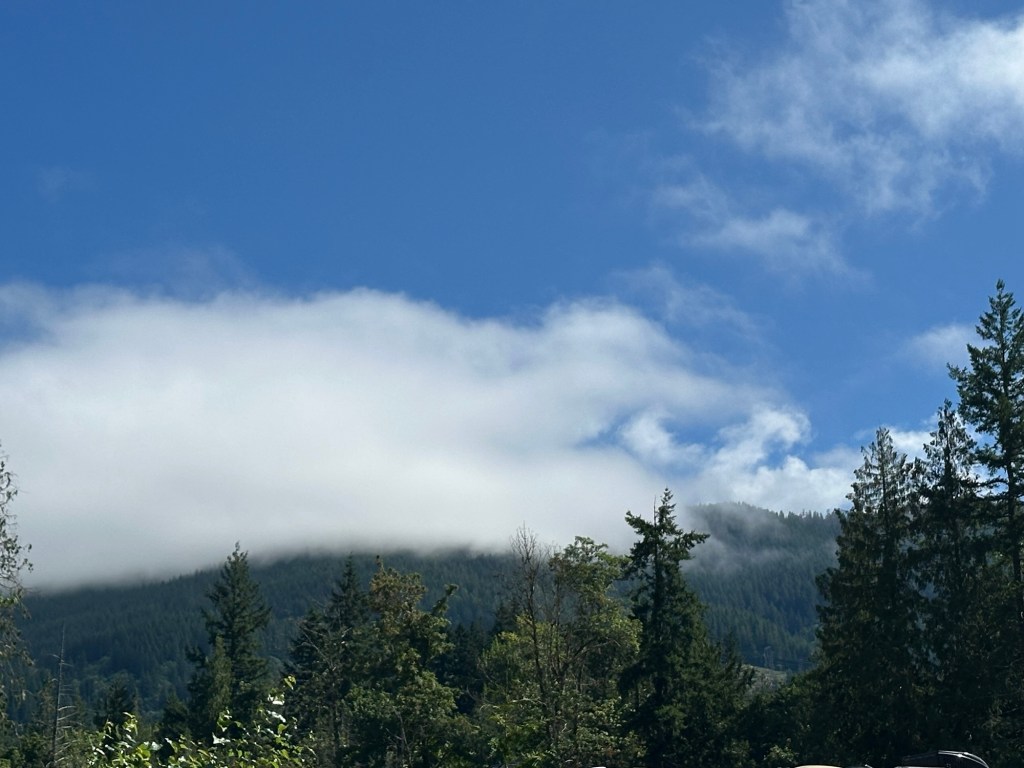 Clouds over mountains in Welches, Oregon. Picture by Happy Vegan Campers.