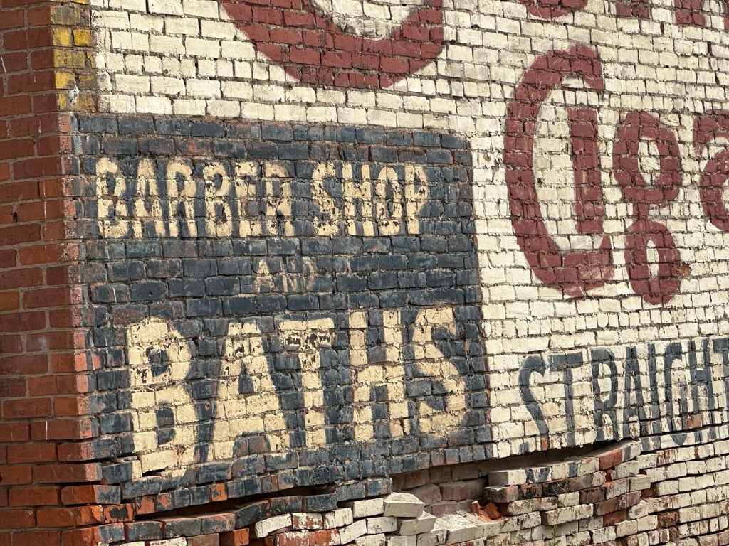 Old sign on building in Sprague, Washington. Picture by Happy Vegan Campers.