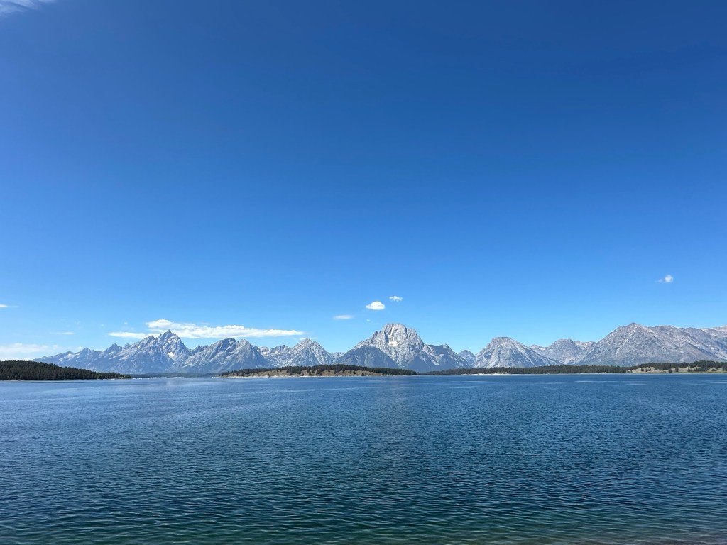 View of Teton Mountain Range from Jackson Lake Dam in Grand Teton National Park in Wyoming, USA.