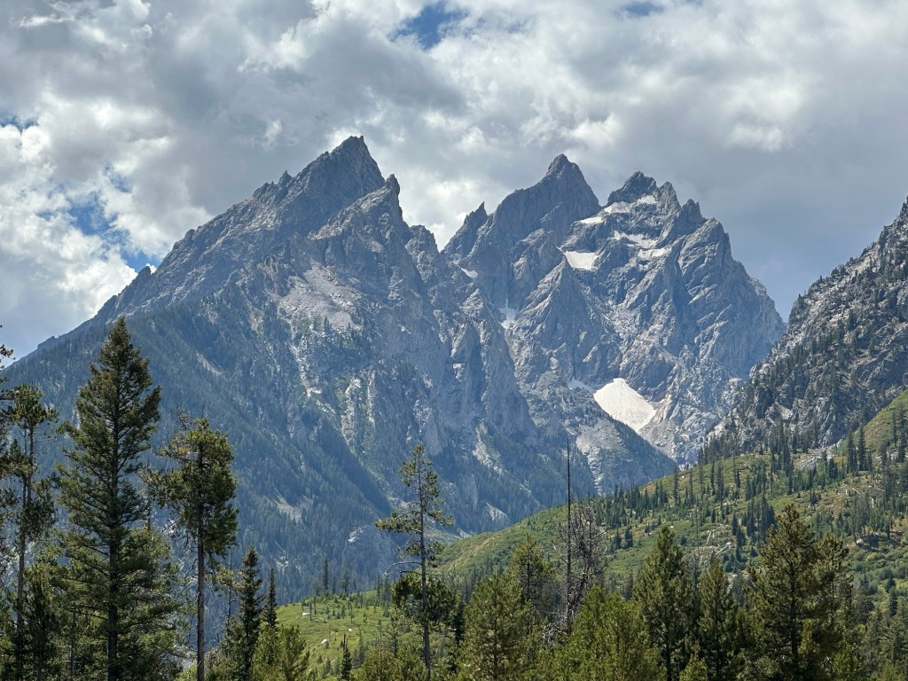 View of mountains from Jenny Lake in Grand Teton National Park in Wyoming, USA.
