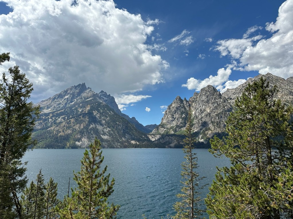 View of mountains from Jenny Lake in Grand Teton National Park in Wyoming, USA.
