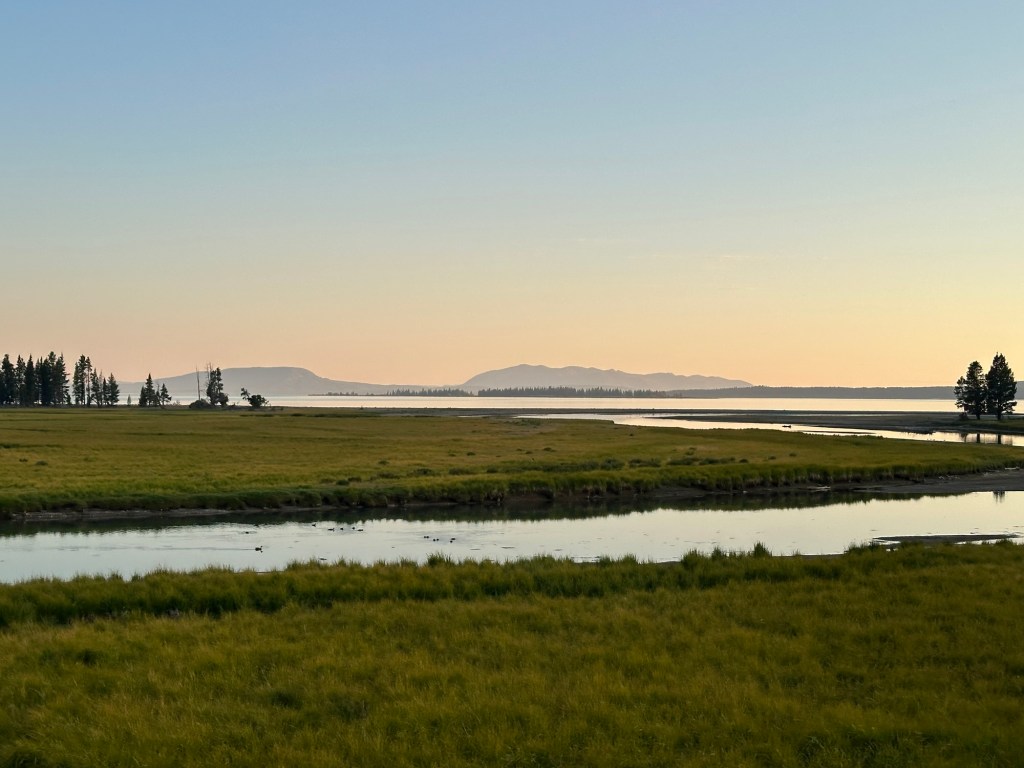 Sunset and Yellowstone River in Yellowstone National Park in Wyoming, USA.