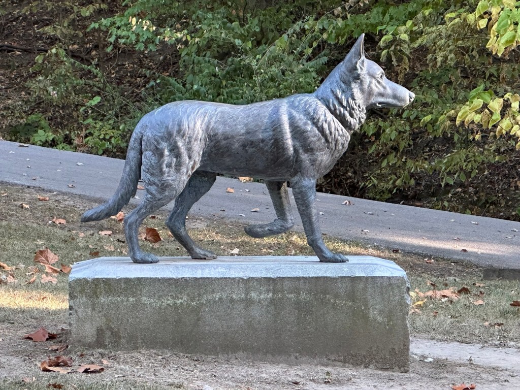 Dog statue in Springdale Cemetery in Peoria, Illinois, USA.