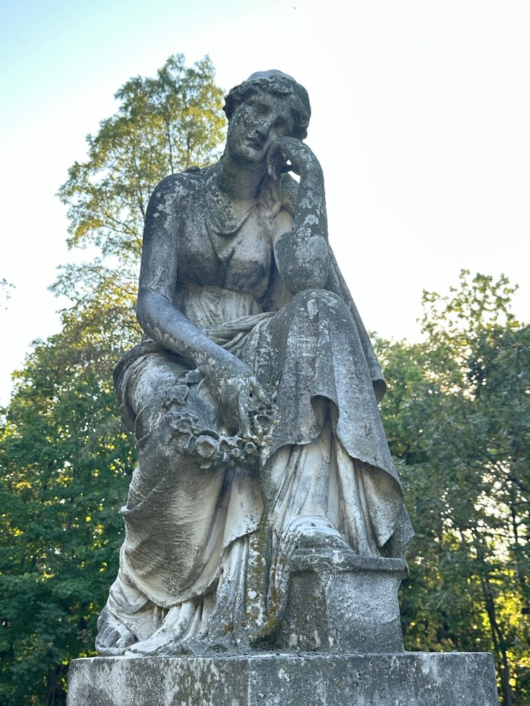 Statue of woman at Springdale Cemetery in Peoria, Illinois, USA.